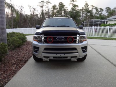 7 finished spot lights with red trim black mesh in OEM fog space Feb 2020.JPG
