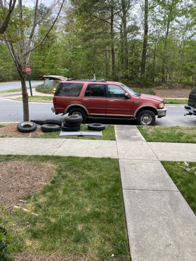 Expedtion and tire pile.JPG